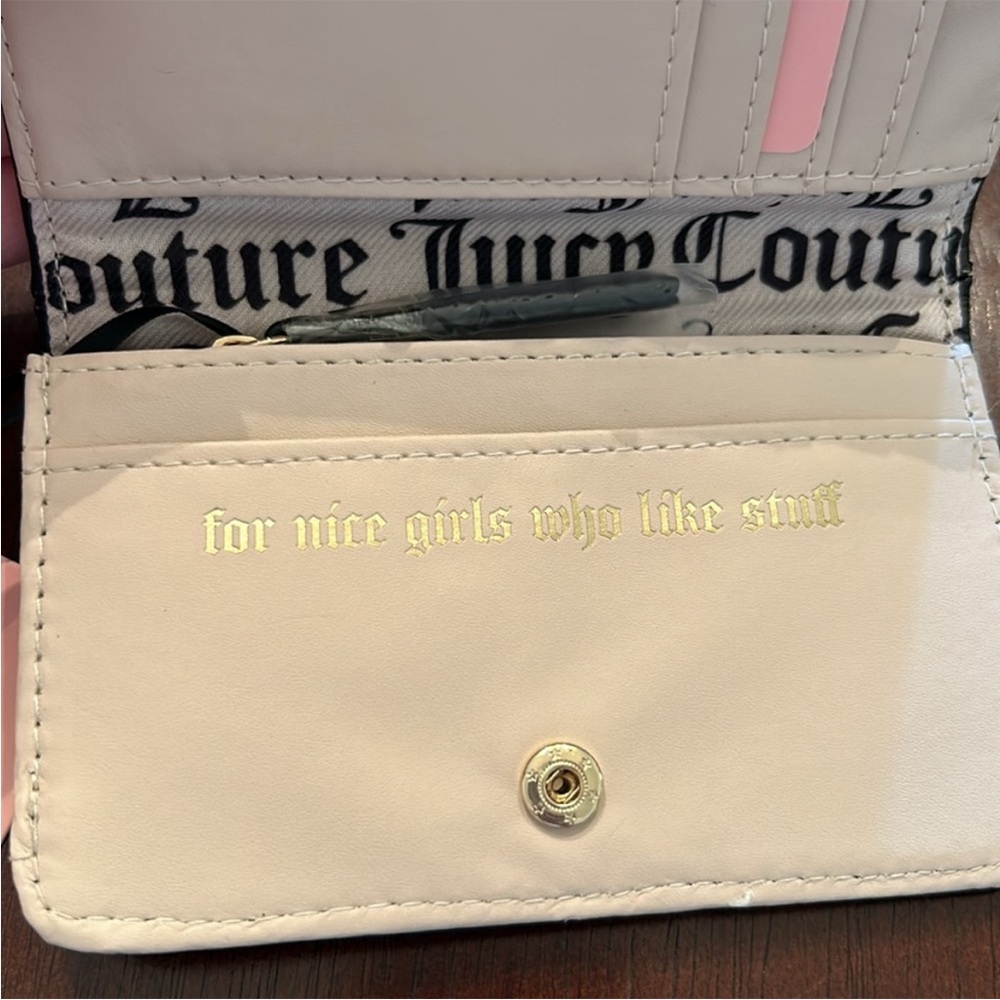 Juicy Couture Flawless Slim Elongated
Licorice Bifold - Picture 5 of 10